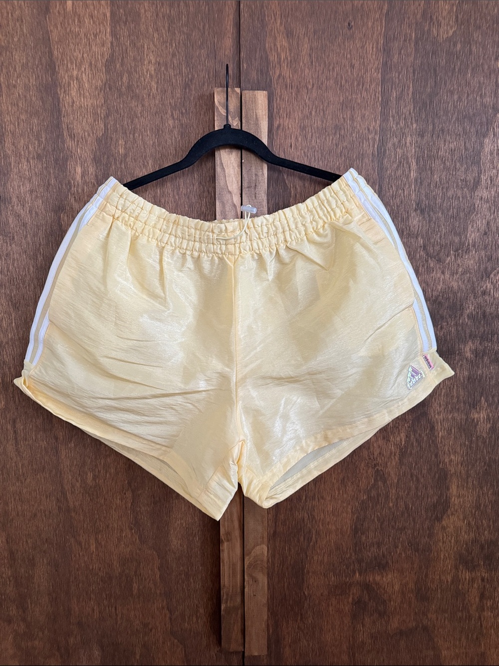 adidas Women’s Pale Yellow Athletic Shorts with White Side Stripes